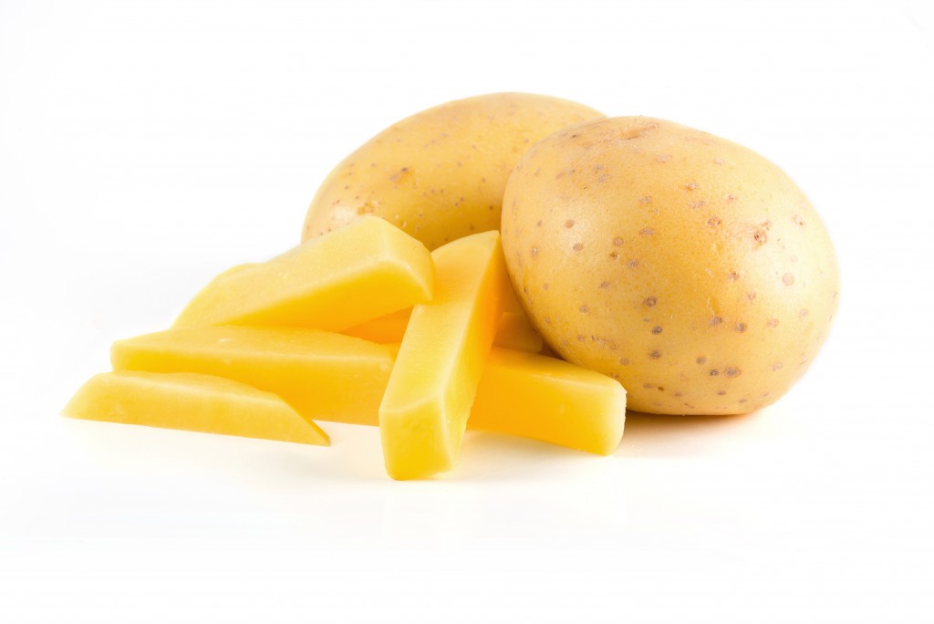 Isolated potatoes with french fries on white background